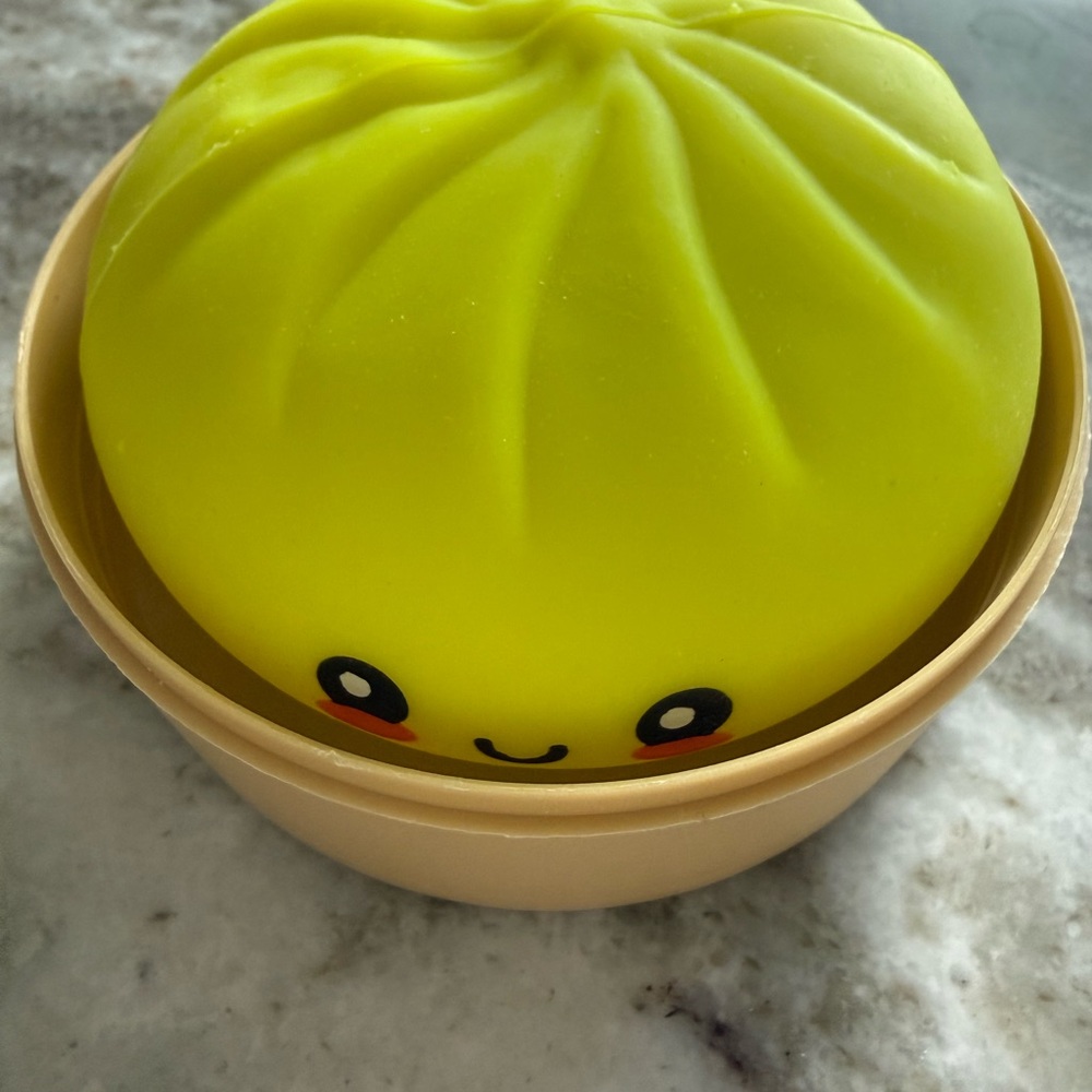 Dumpling Squishy Bun Toy in lime yellow color - Picture 3 of 4